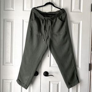 Khaki green gathered drawstring waist pant with cargo style front pockets